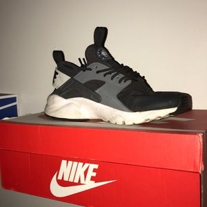 Black and grey Nike shoes